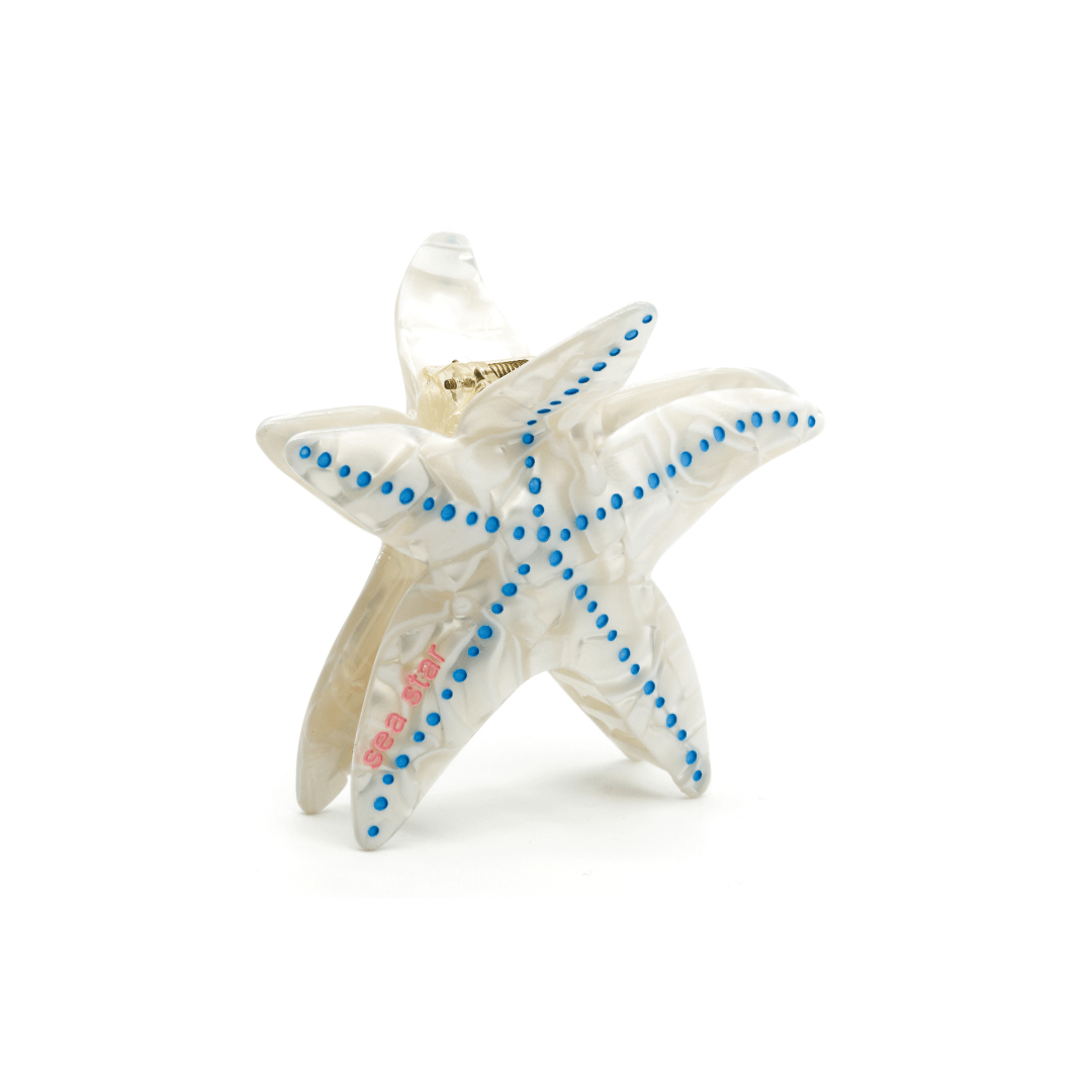 STARFISH HAIRCLIP featuring a playful design with blue accents, crafted from durable cellulose acetate.