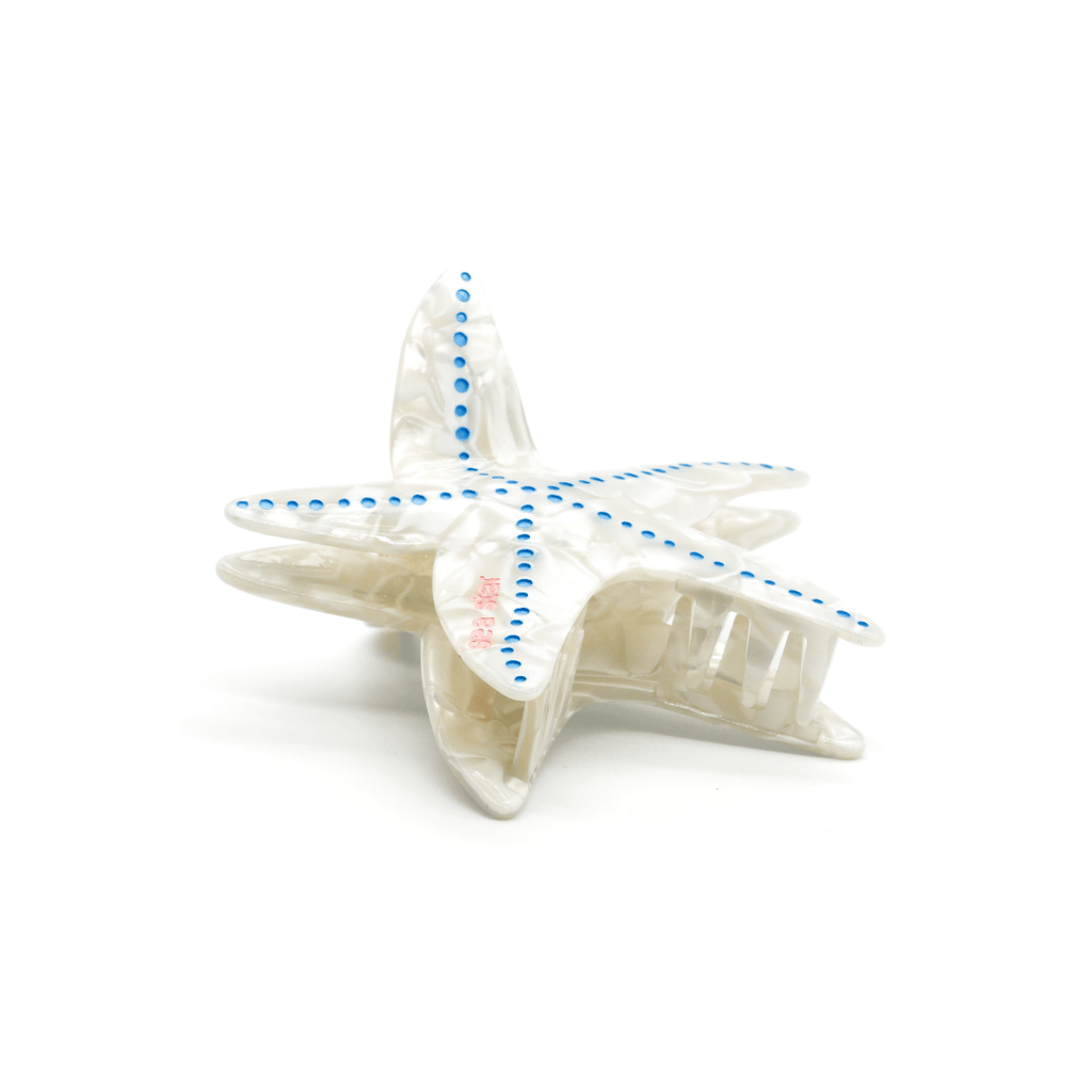 STARFISH HAIRCLIP showcasing smooth cellulose acetate design with playful blue accents.